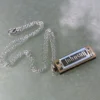 Crescendo Music Mini Harmonica On Necklace